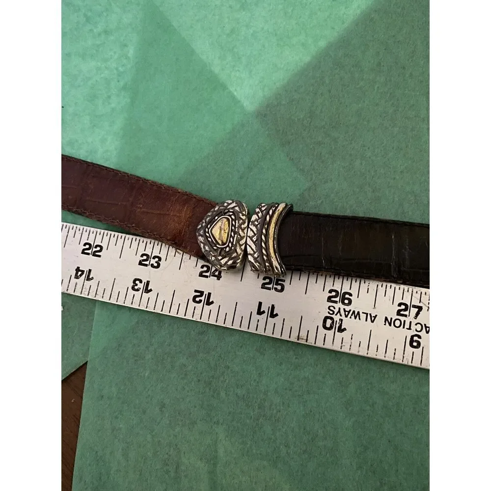 Ladies leather reversible belt black and brown with embellishments. Size med/30.